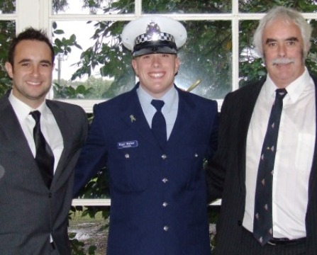 Newly-graduated Constable Nigel Walker is flanked by brother Murray and dad Charlie.